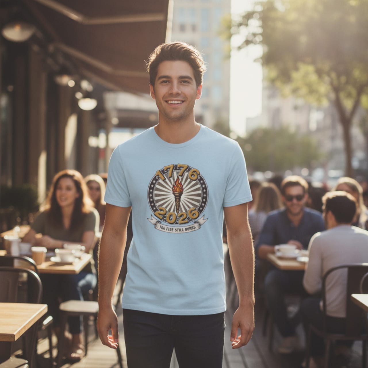 T-Shirt Light Blue / S The Fire Still Burns — 1776–2026 Liberty Torch Tee